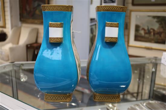 A pair of Minton porcelain flattened baluster vases, c.1880, height 10in.